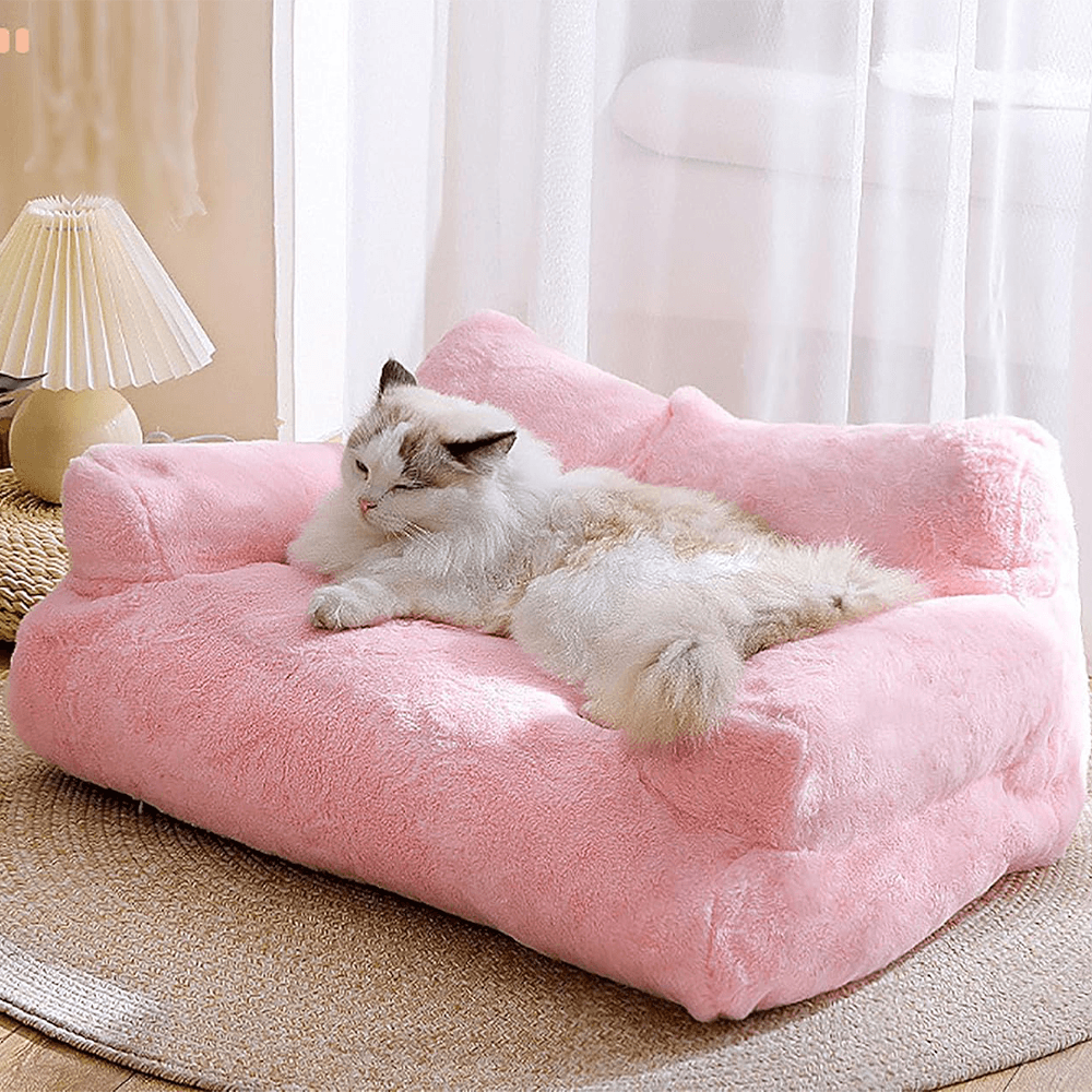 Bed for Cats and Small Dogs Purrfect Pet Haven plush pink sofa bed with bolsters and sleeping cat
