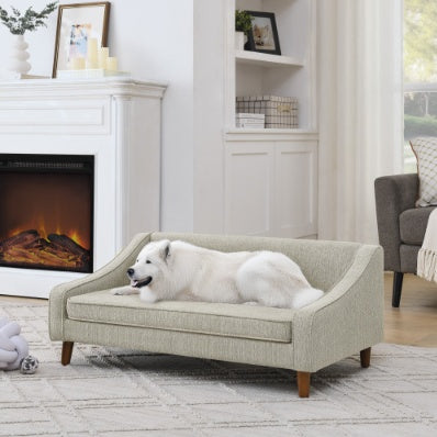 Wefulfil Dog Sofa Bed beige with raised bolsters and wooden legs white dog lounging in cozy living room