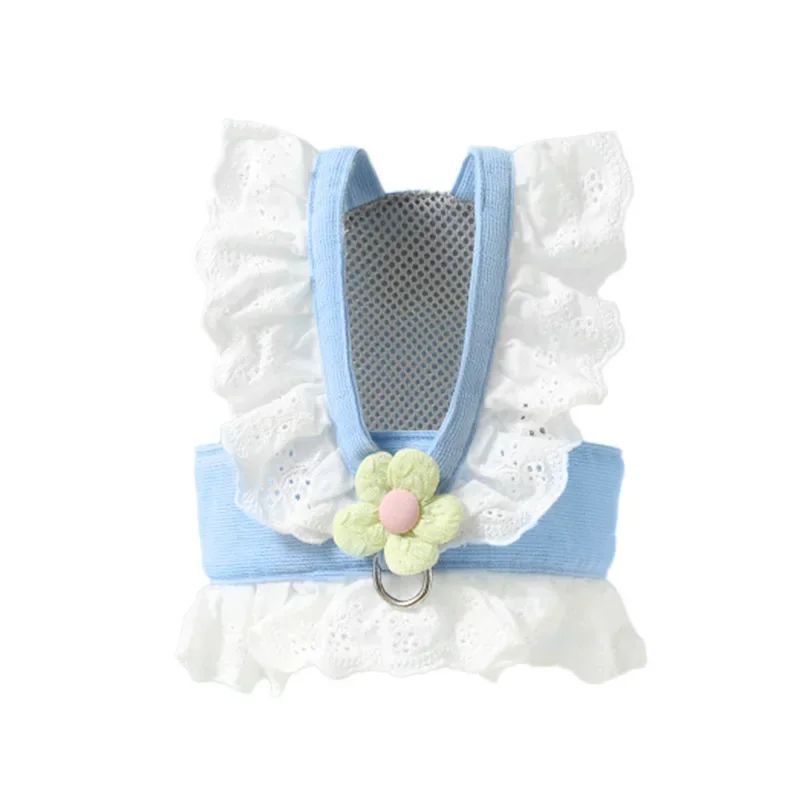 Pet harness with white lace, blue straps, and a floral design on a white background