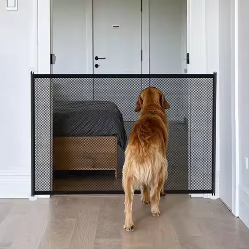 Purrfect Pet Haven black mesh pet safety stair gate installed in doorway blocking golden retriever from bedroom