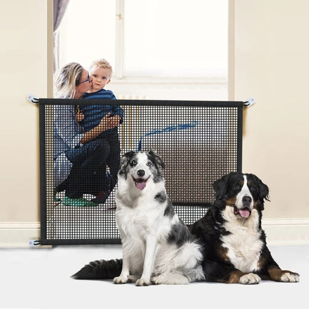 Purrfect Pet Haven pet safety stair gate mesh barrier in doorway with two large dogs in front and child and adult behind