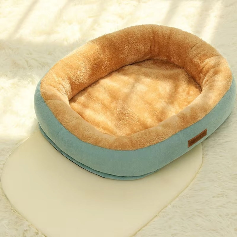 Purrfect Pet Haven Plush Oval Pet Bed light blue exterior with tan faux fur interior and raised bolster