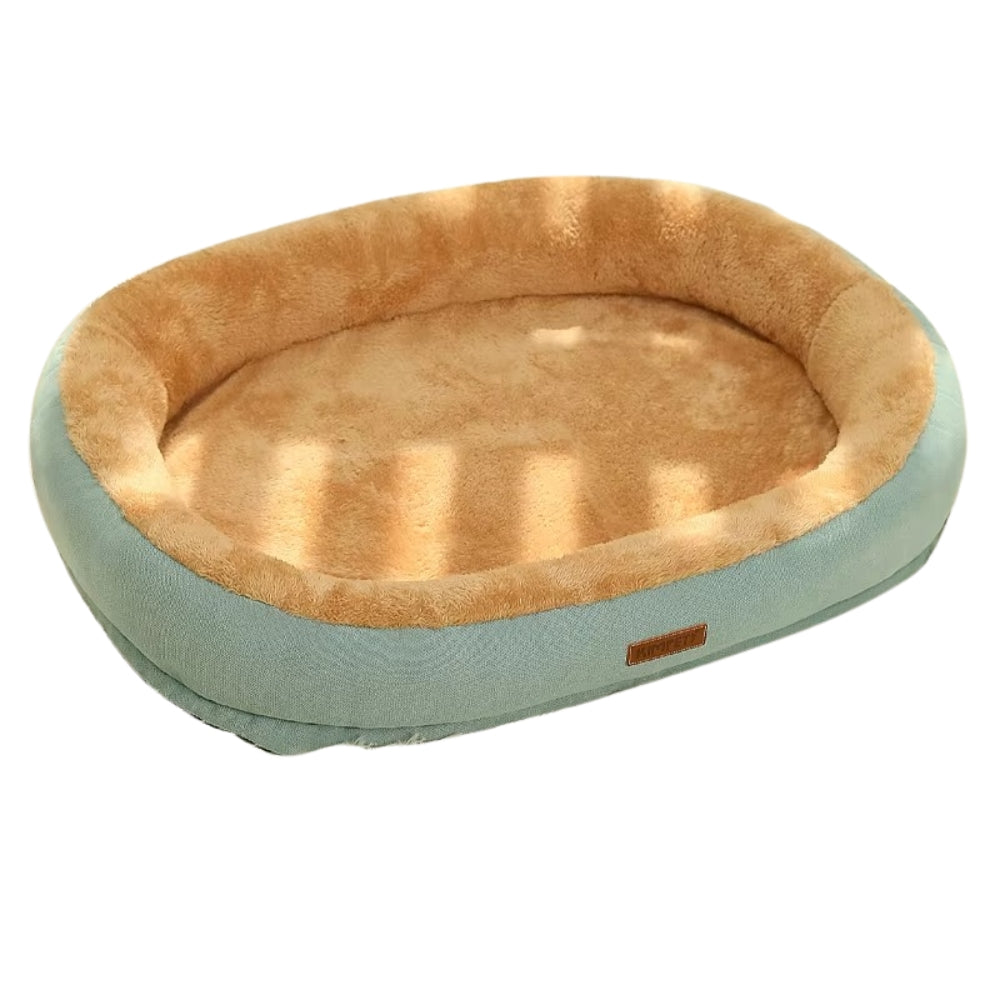 Purrfect Pet Haven Plush Oval Pet Bed in seafoam green with tan faux fur interior and raised bolsters for pets