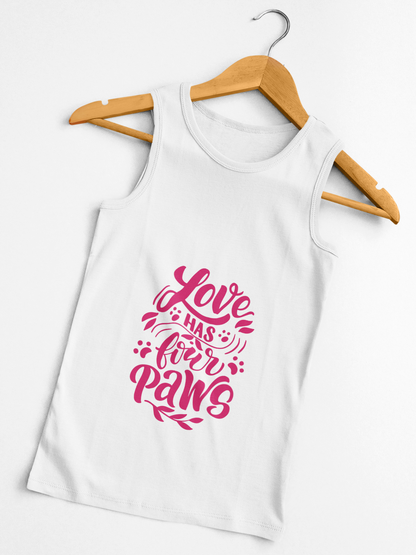 White tank top from Printify with pink Love Has Four Paws graphic design on front
