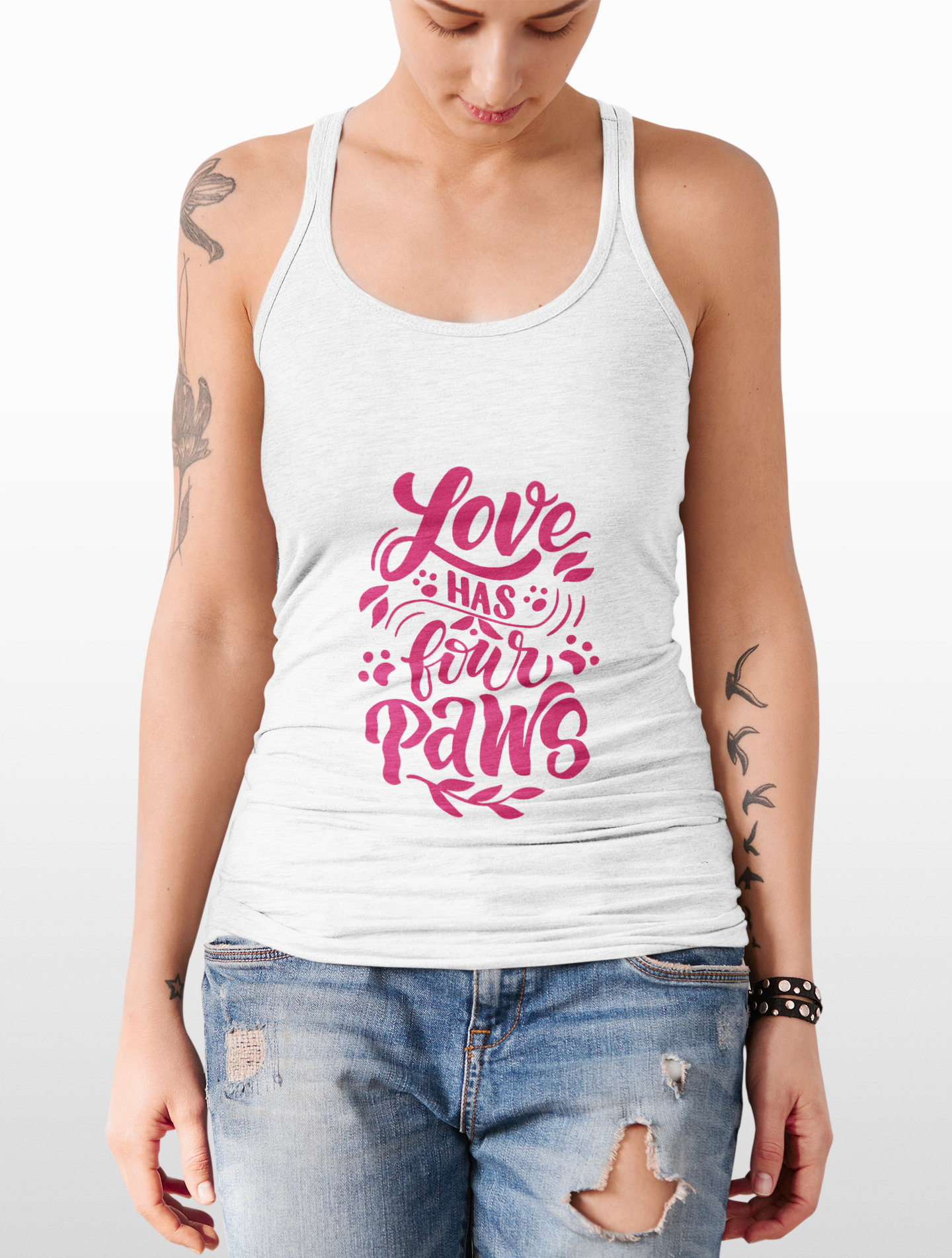 White tank top by Printify with red Love Has Four Paws design worn by tattooed model