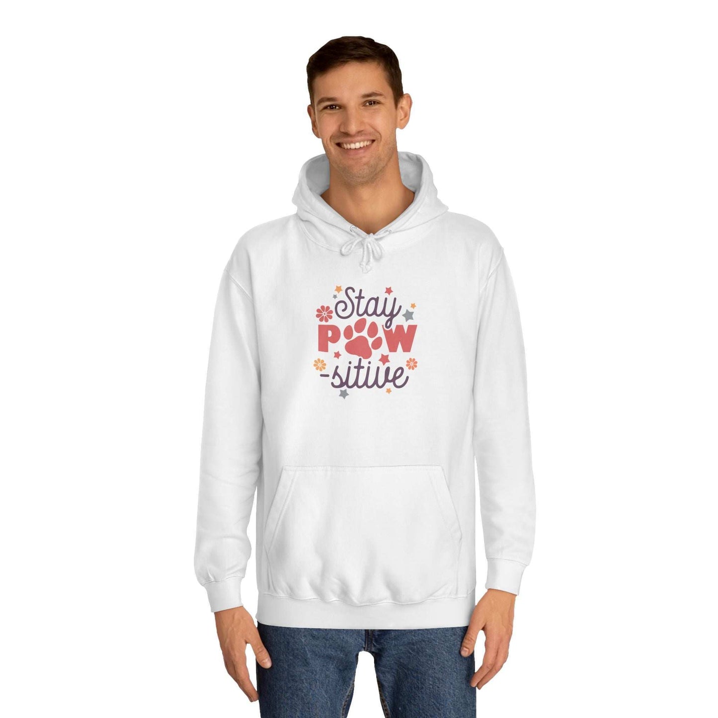Stay Pawsitive Unisex Hoodie white pullover on smiling male model with paw graphic and floral accents and kangaroo pocket