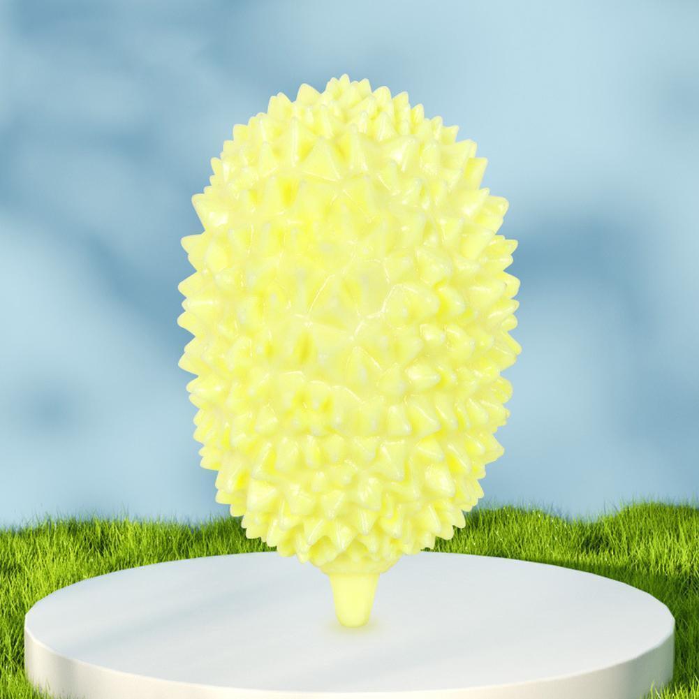 Wefulfil durian shaped dog chew toy in yellow spiky rubber on pedestal for durable chewing and fetch