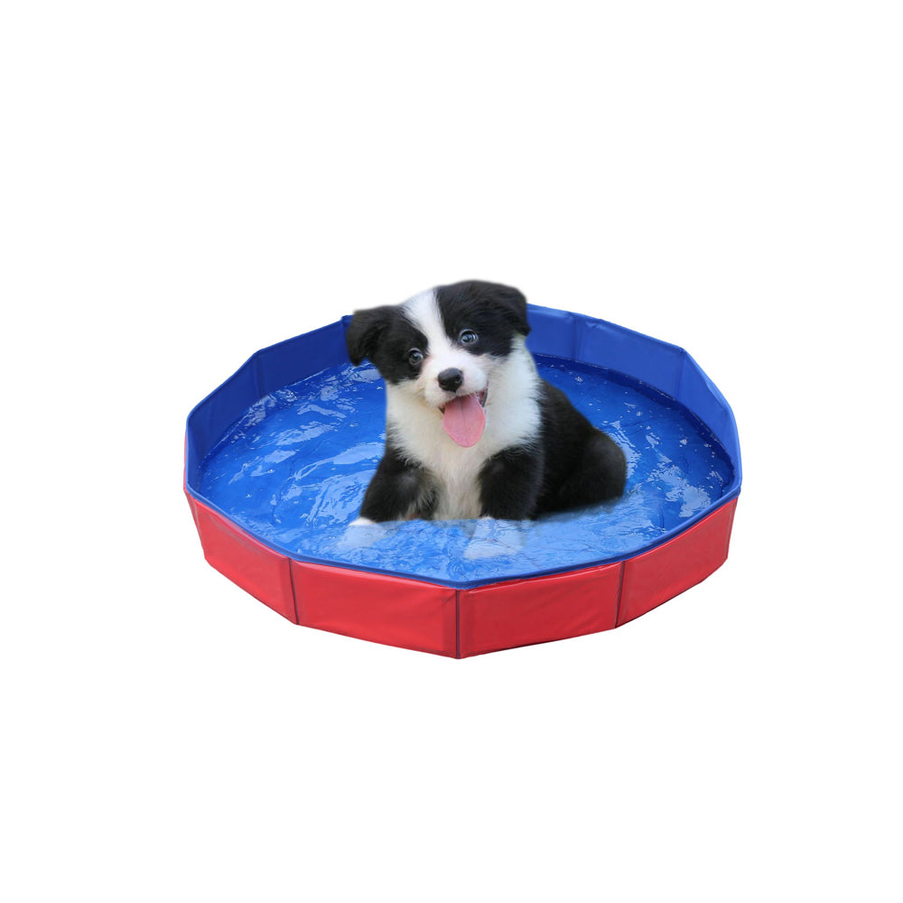 Purrfect Pet Haven Pet Outdoor Swimming Pool red foldable pool with blue interior and puppy cooling off
