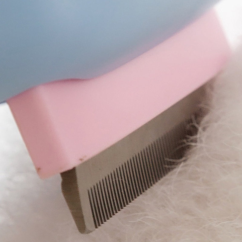 Wefulfil pet deshedding brush for dogs and cats closeup showing stainless steel teeth removing white fur