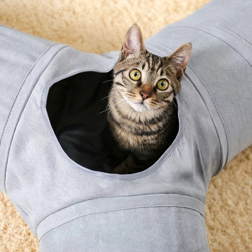 Purrfect Pet Haven collapsible cat tunnel gray fabric with tabby cat peeking through side opening on carpet