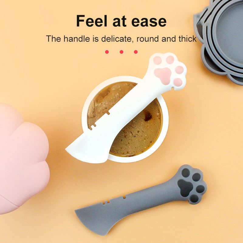 Wefulfil Scoop Spoon Jar Opener in white and gray with paw-shaped handles for pet food jars
