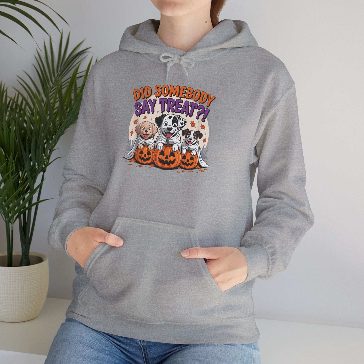 Printify grey hoodie featuring Halloween Dog Sweatshirt design three dogs in ghost costumes with jack o lanterns