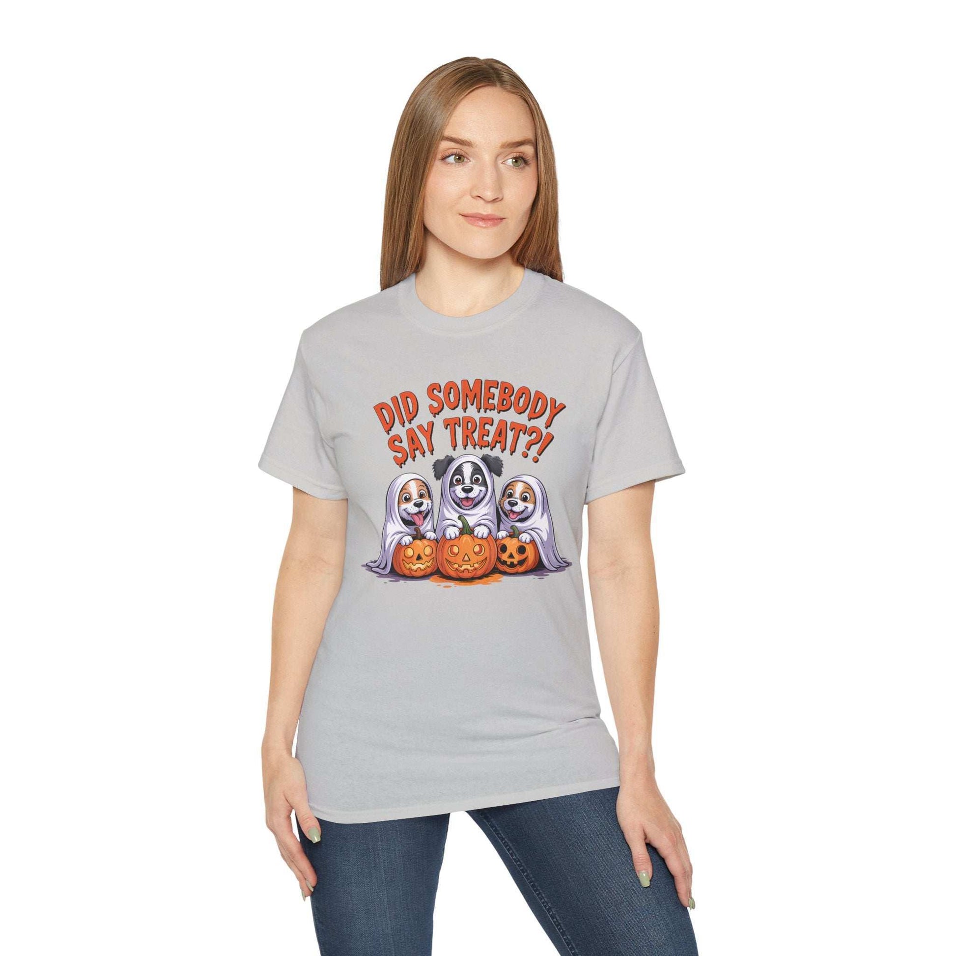 Spooky Halloween Dog Tee light gray with three dogs in ghost costumes holding jack o lanterns and treat slogan