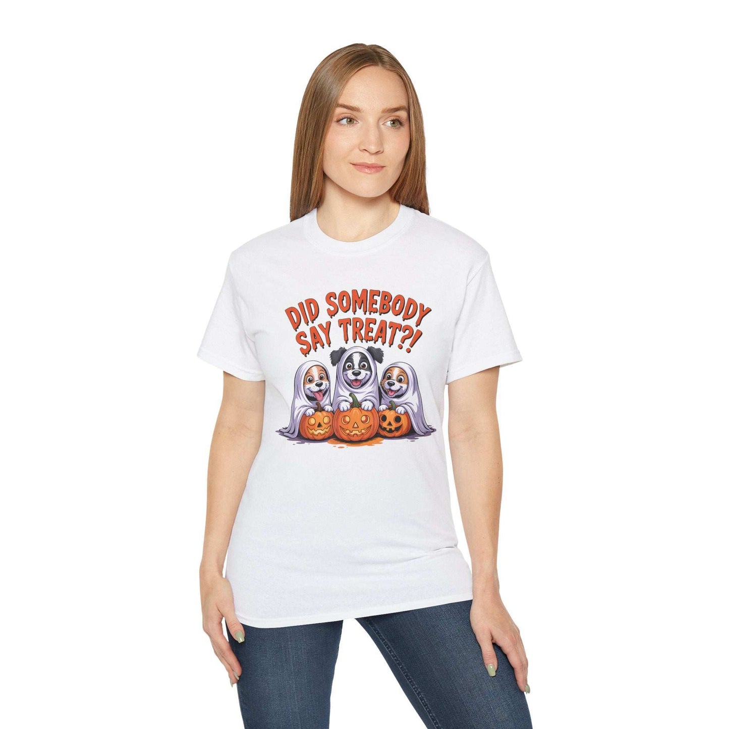 Printify Spooky Halloween Dog Tee on woman model white shirt featuring three dogs in ghost costumes with jack o lanterns