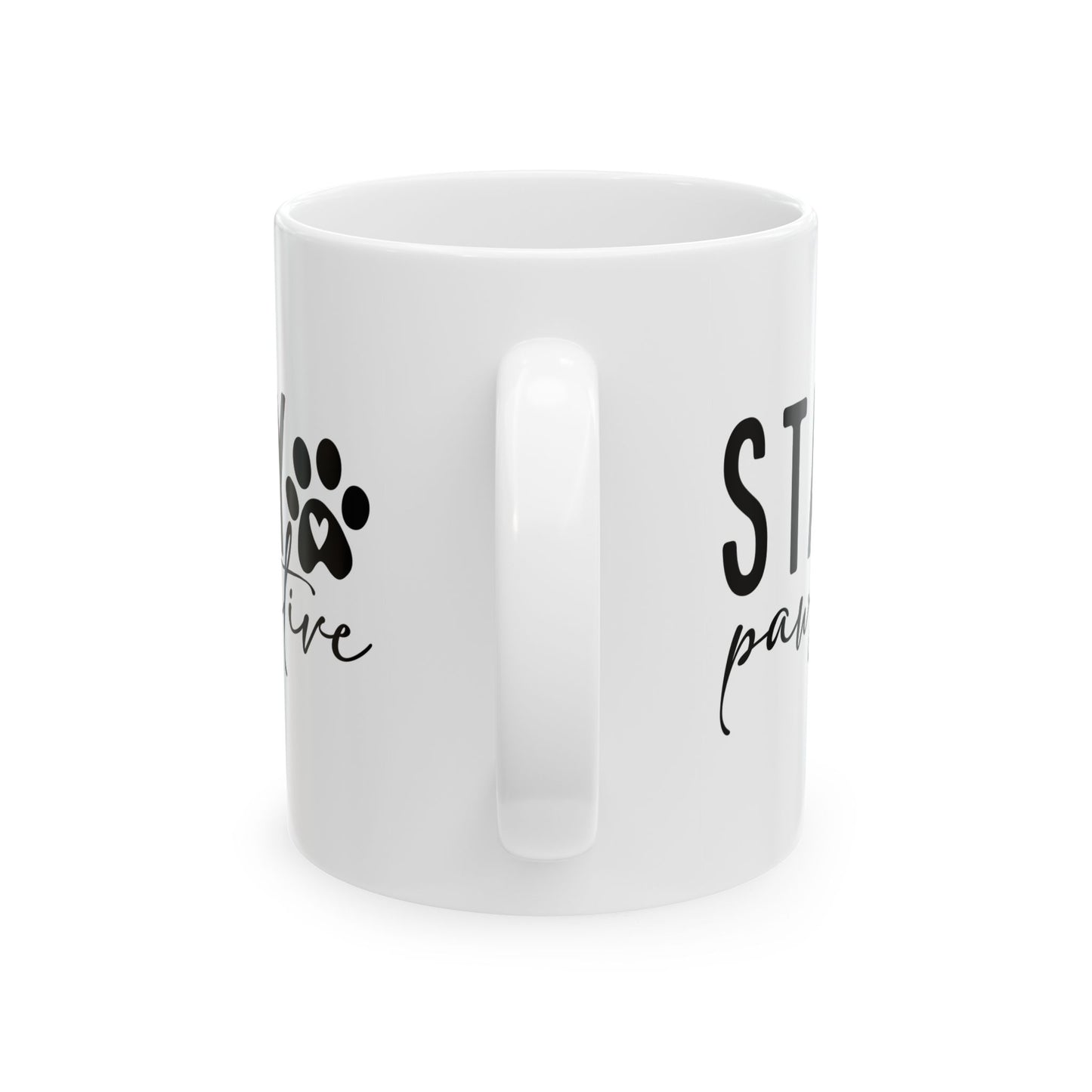 White ceramic Stay Pawsitive Mug with black paw print design and positive message from Printify