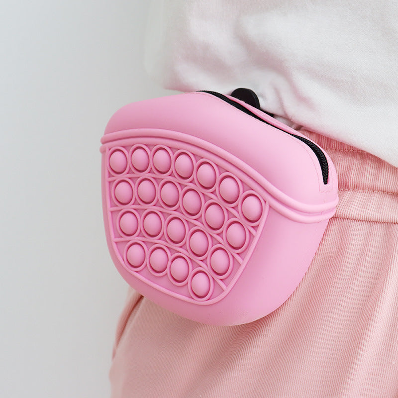 Wefulfil pink silicone Treat Pouch Bag with bubble pop design worn on waist for pet training