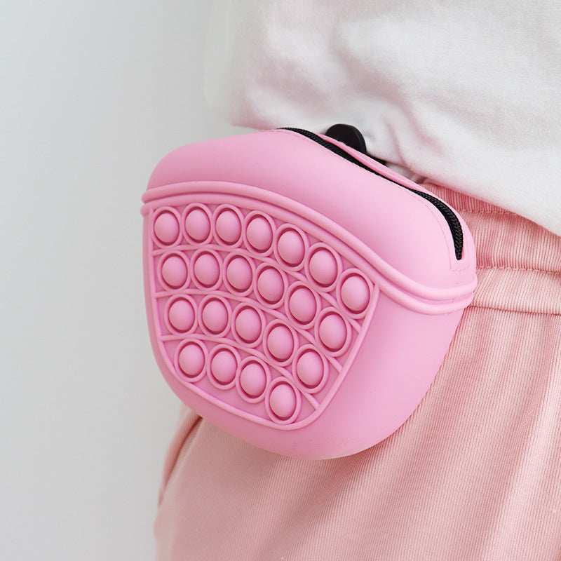 Wefulfil pink silicone Treat Pouch Bag with bubble pop design worn on waist for pet training