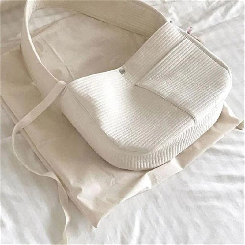 Wefulfil Cozy Pet Sling Carrier in white fabric with adjustable strap for comfortable pet carrying