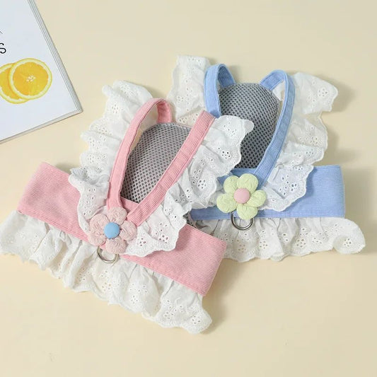 Pet harness with floral design on a beige background