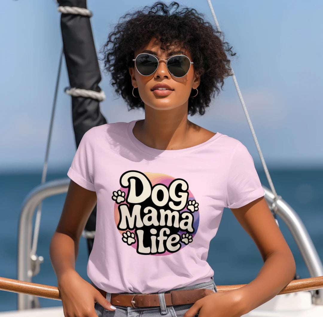 Woman wearing a 'Dog Mama Life' t-shirt on a boat with ocean background