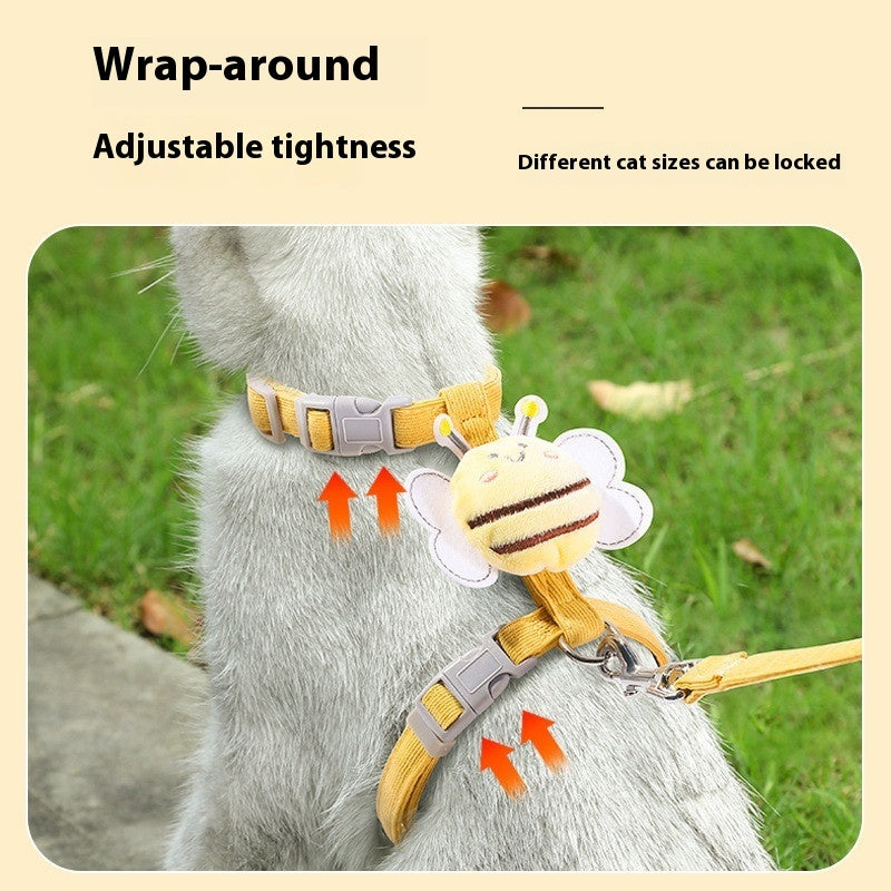 Cat collar with bee design and adjustable leash on a cat in a grassy area