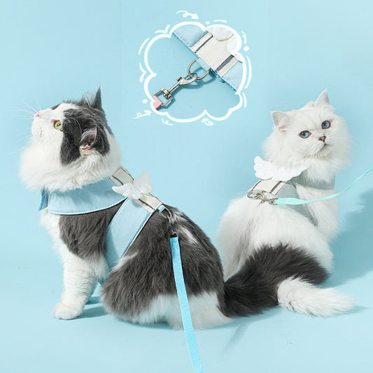 Two fluffy cats wearing Wefulfil Cat Harness Leash Set in blue with secure buckles on light blue background