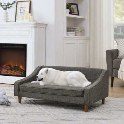Dog Sofa Bed Wefulfil gray upholstered sofa style bed with wooden legs and white dog in living room near fireplace