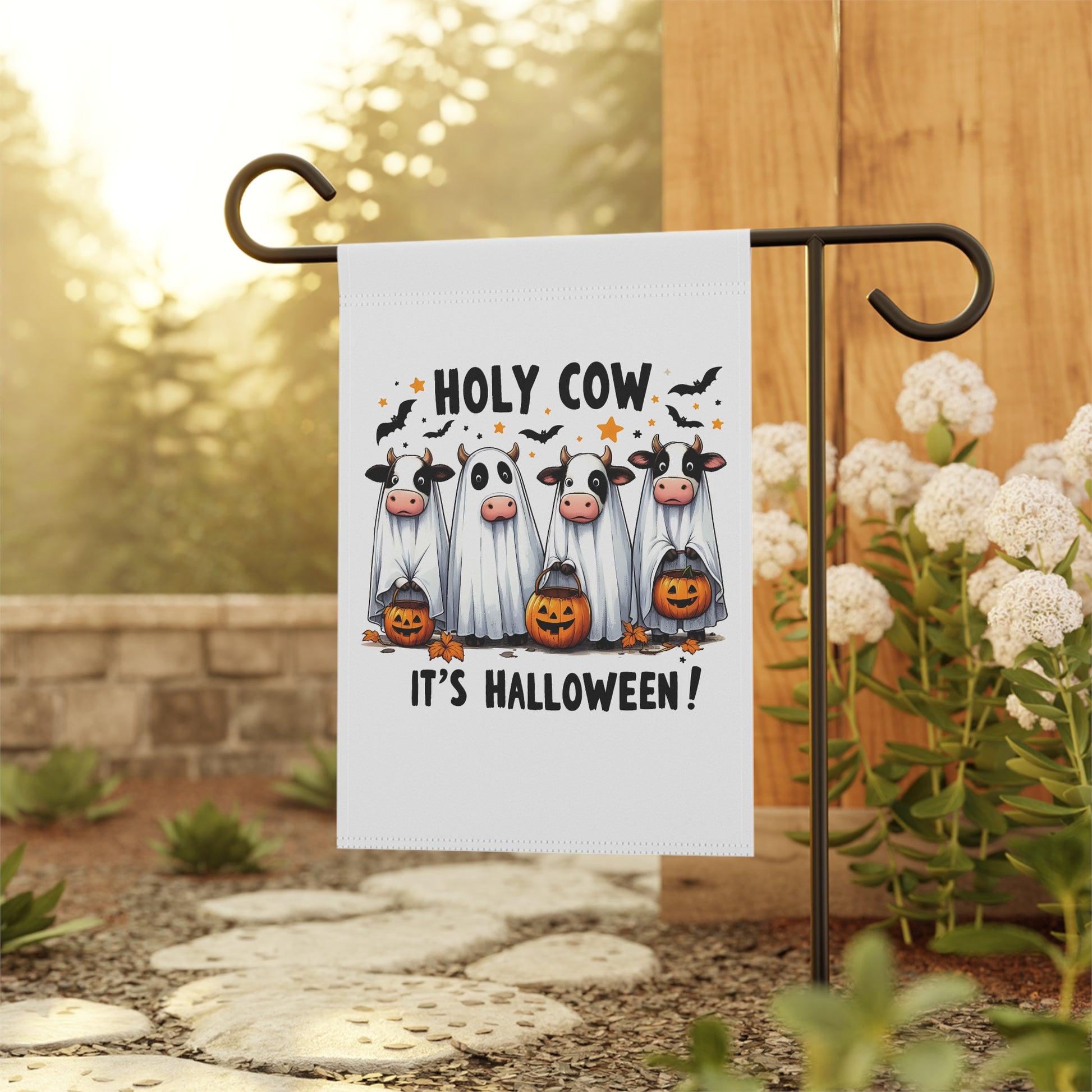 Printify Halloween Garden Banner featuring four cows dressed as ghosts holding jack o lanterns on a white garden flag