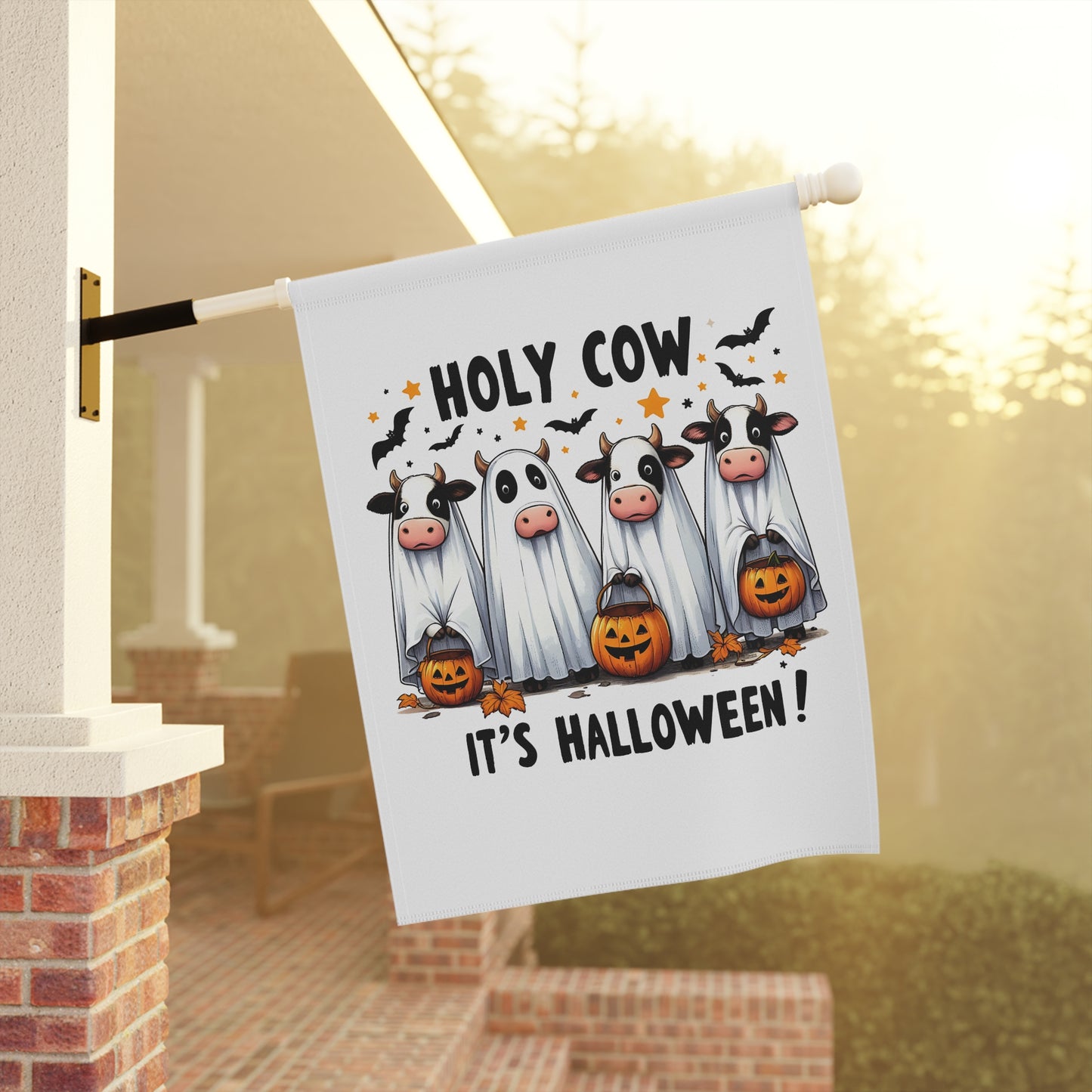 Printify Halloween Garden Banner with four cows dressed as ghosts holding jack o lanterns bats and text holy cow its halloween