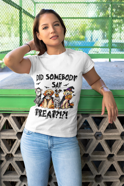 Woman wearing Printify Heavy Cotton T-Shirt white Halloween graphic with three dogs in costumes and Did Somebody Say Treat text