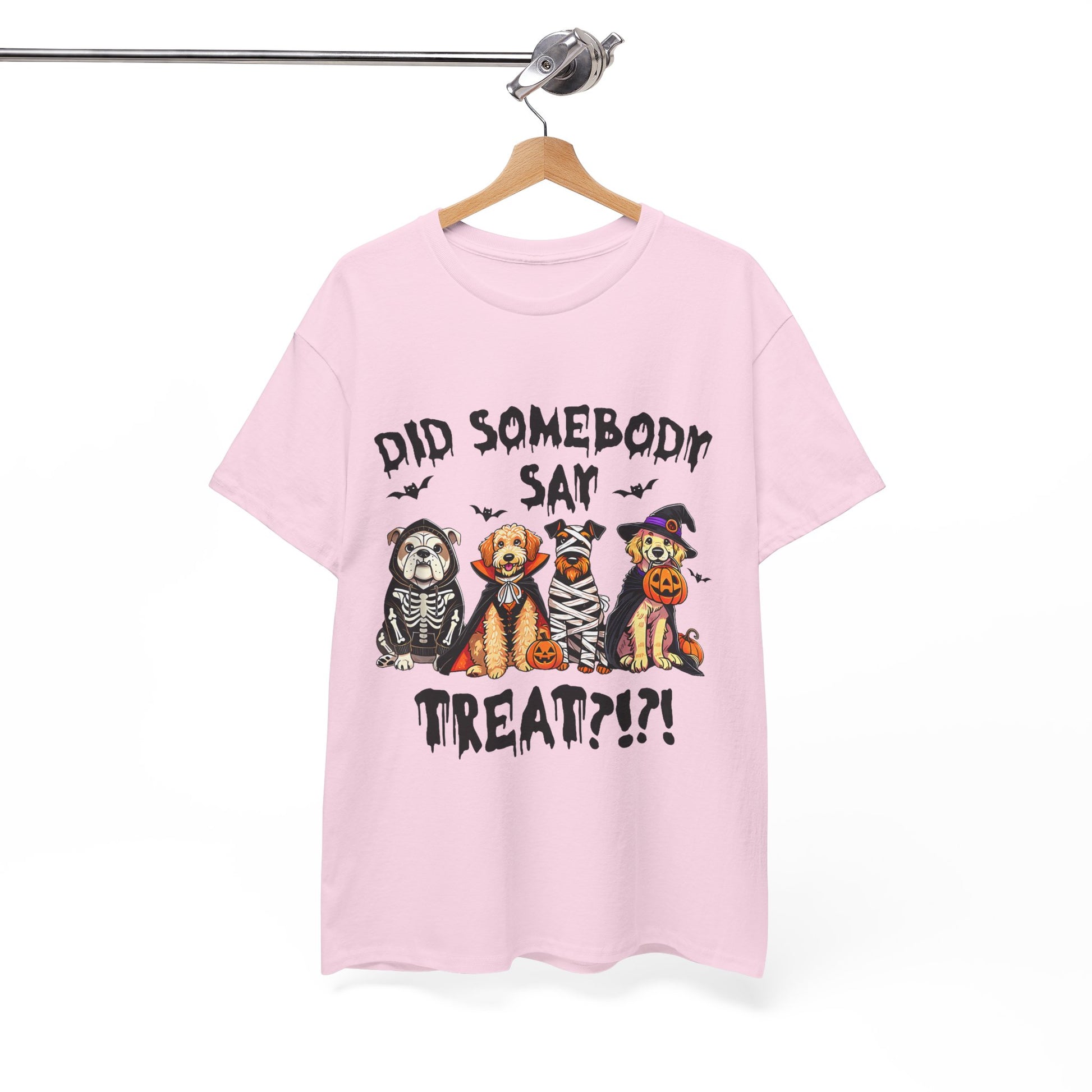 Light pink Heavy Cotton T-Shirt from Printify featuring four dogs in Halloween costumes and Did Somebody Say Treat text