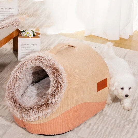 Pet bed with fluffy interior and a small white dog next to it on a carpeted floor.