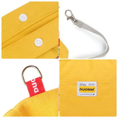 Details of Wefulfil Open Hole Cat Carrier showing yellow fabric, metal clasp, and red branded tag
