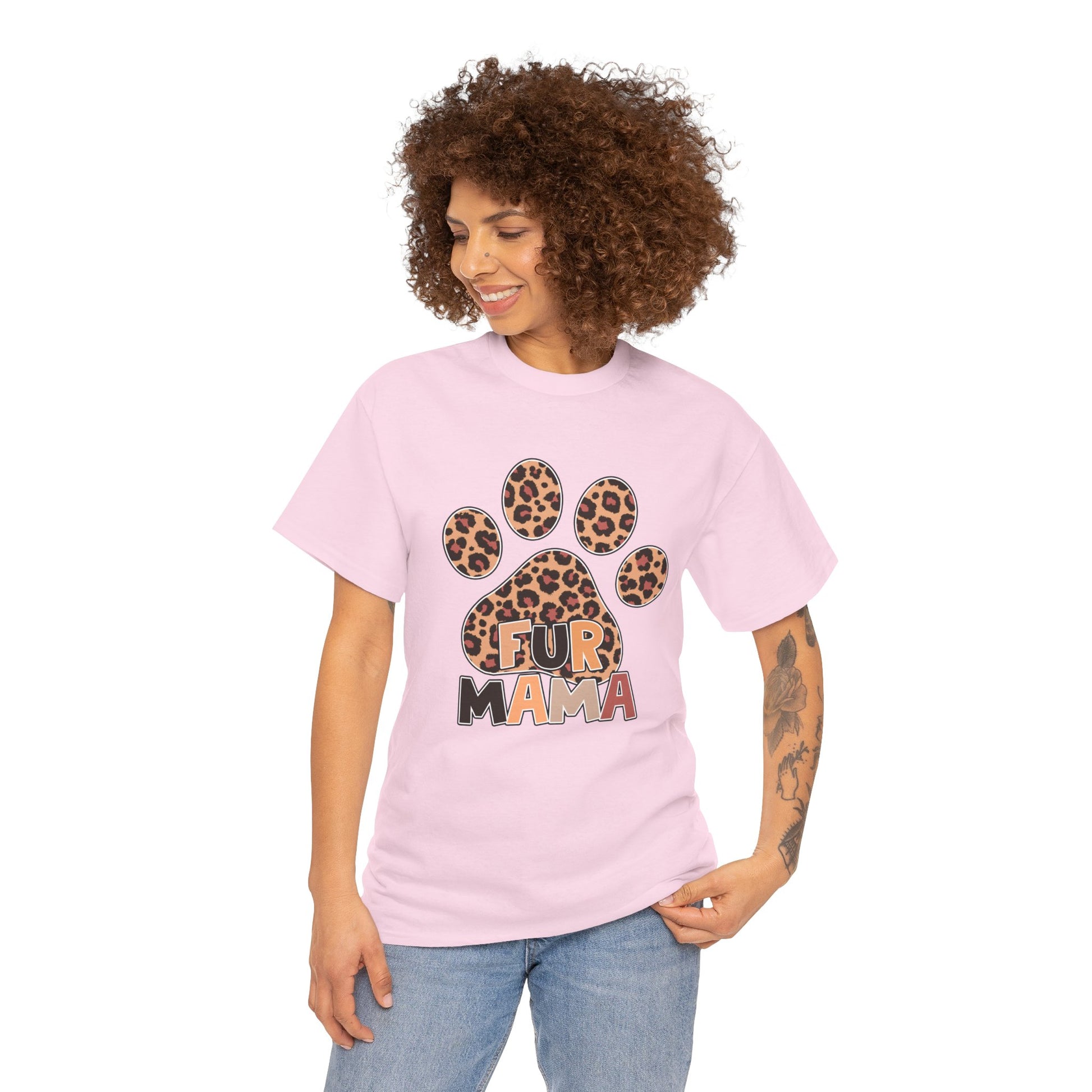 Printify light pink Heavy Cotton T-Shirt with leopard paw print and FUR MAMA graphic worn by smiling woman