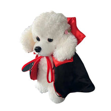 Cute Halloween Pet Costume featuring a plush dog in a cape with a bow for festive celebrations
