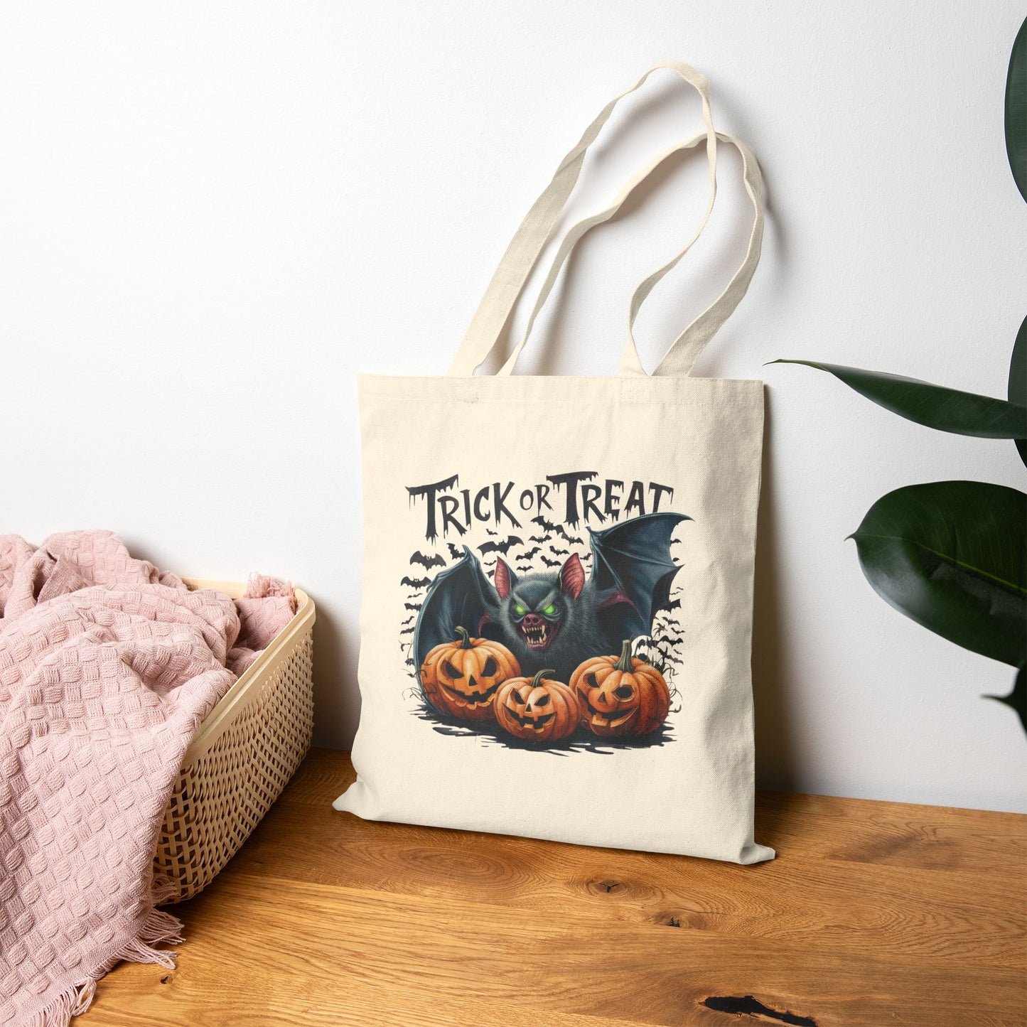 Printify Canvas Tote Bag in natural canvas with Halloween Trick or Treat bat and carved pumpkin design