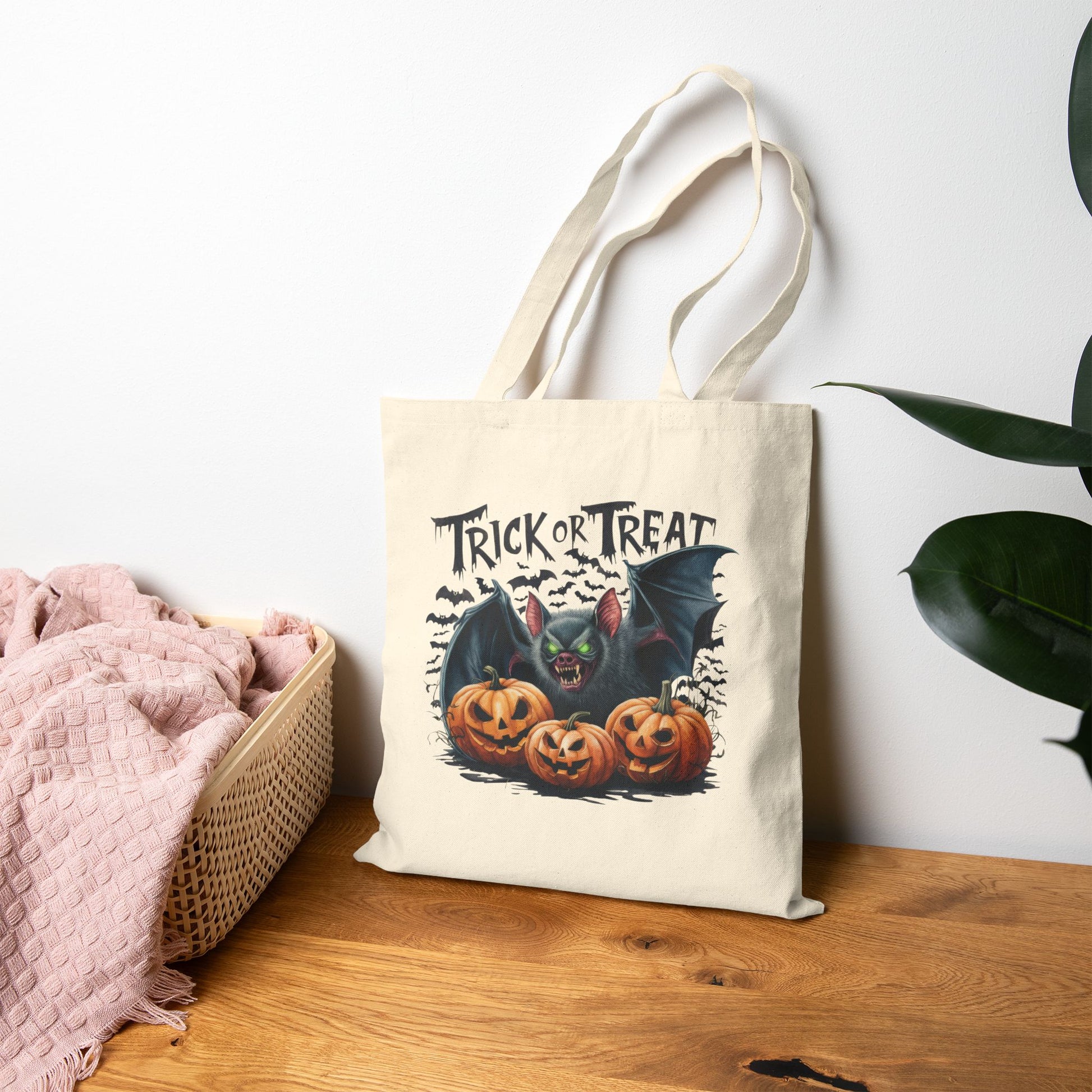 Printify Canvas Tote Bag in natural canvas with Halloween Trick or Treat bat and carved pumpkin design