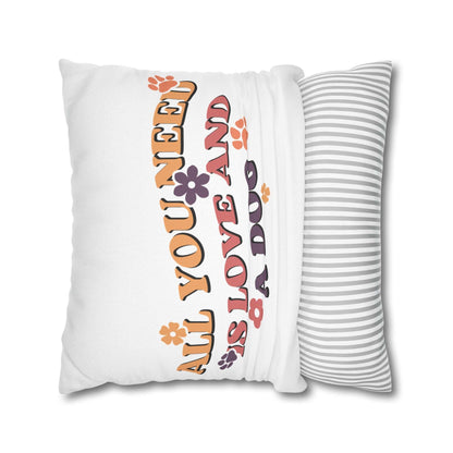 Cozy Throw Pillow with retro floral All You Need Is Love and a Dog design on white cover and gray striped back