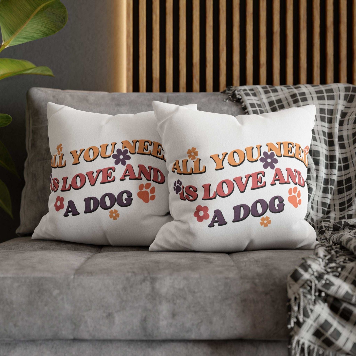 Cozy Throw Pillow set of two white decorative pillows with retro All You Need Is Love and a Dog print on gray sofa
