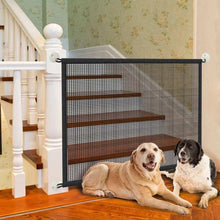 Purrfect Pet Haven pet safety stair gate black mesh mounted on white banister blocking stairs with two dogs