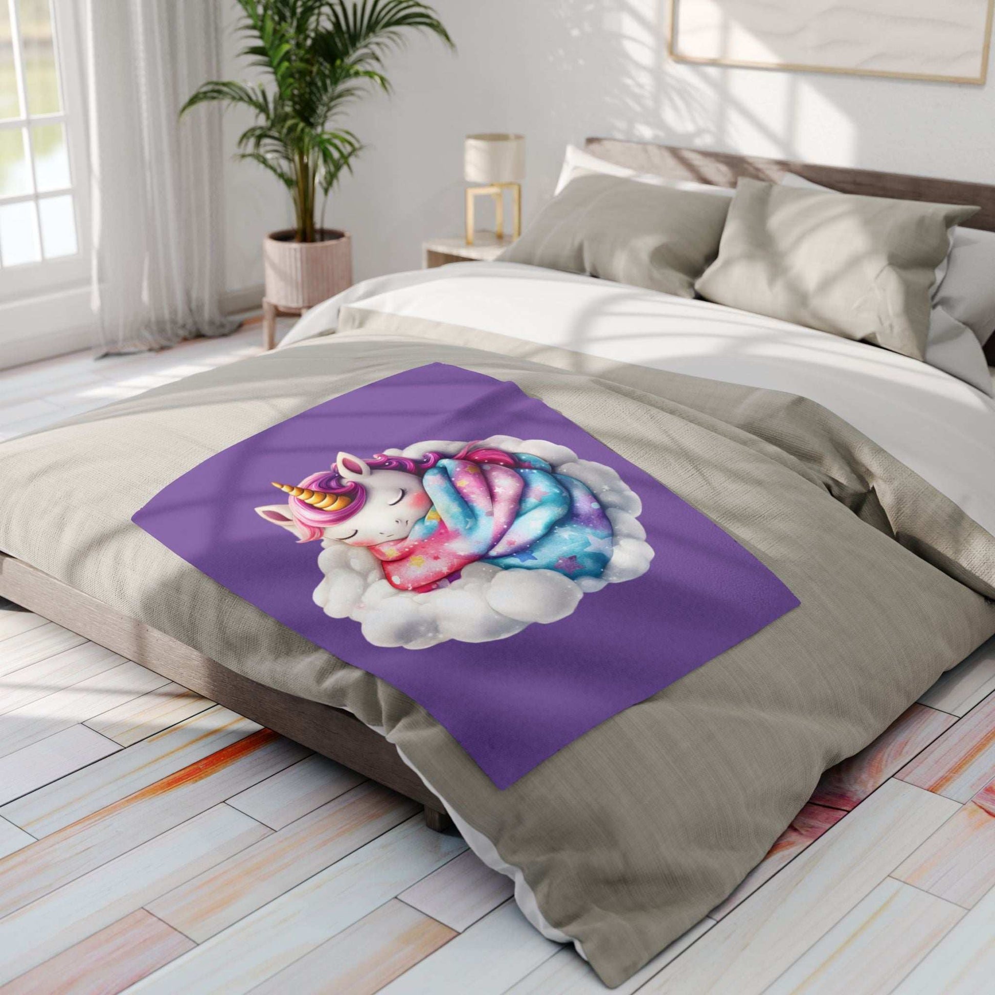 Cozy Throw for Kids featuring sleeping rainbow unicorn on purple blanket displayed on a modern bed