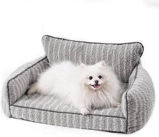 Wefulfil Orthopedic Pet Sofa in gray plush with raised bolsters and backrest small white Pomeranian lounging