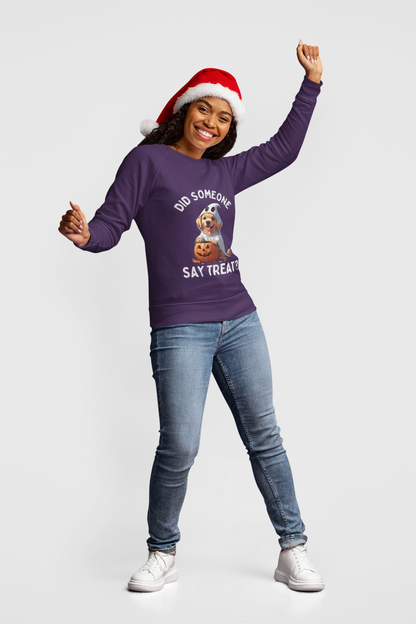 Pet Lover Shirt long sleeve purple sweatshirt with dog and pumpkin graphic worn by smiling woman in Santa hat