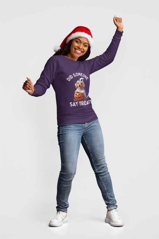 Pet Lover Shirt long sleeve purple sweatshirt with dog and pumpkin graphic worn by smiling woman in Santa hat