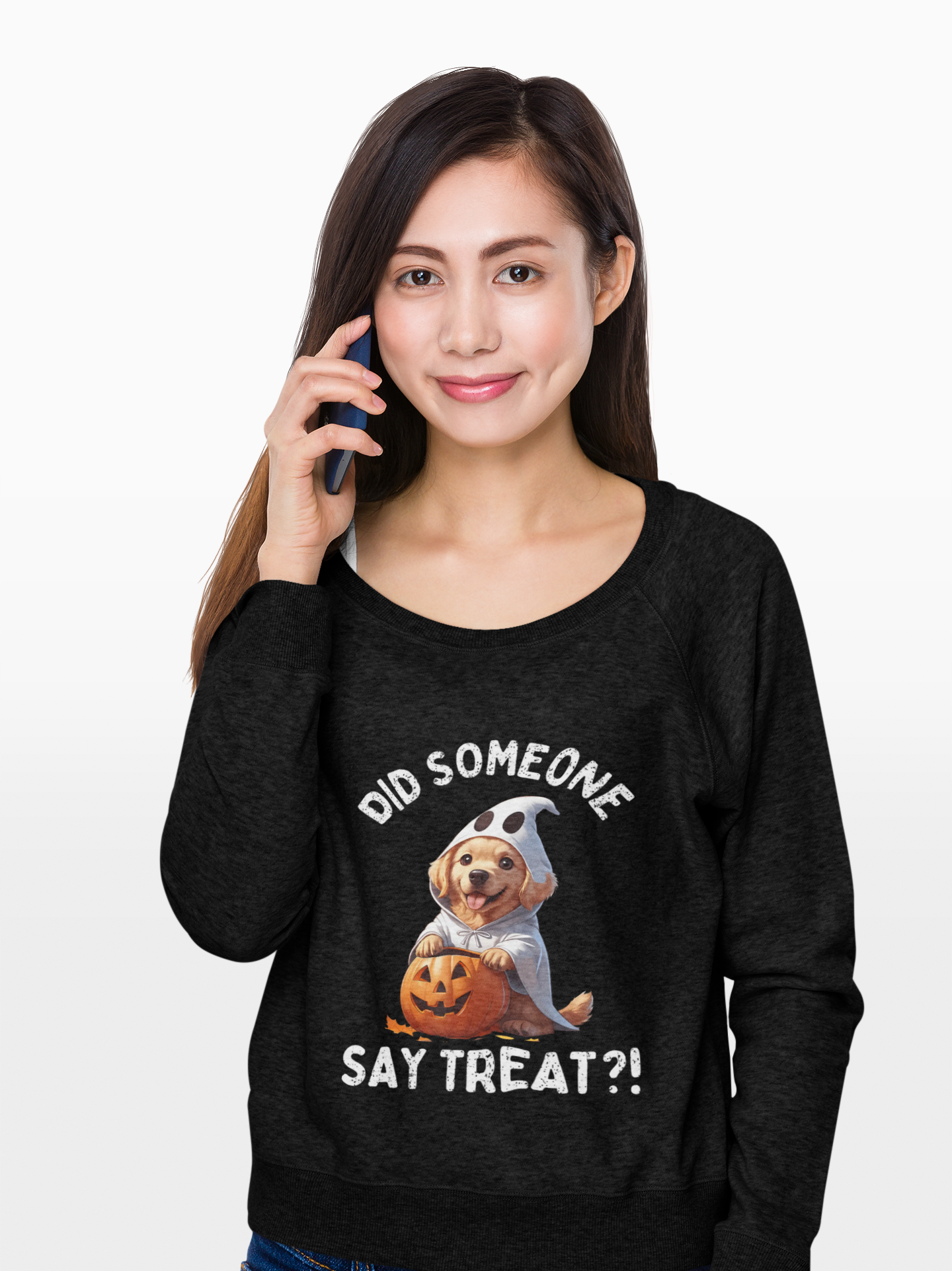 Woman wearing Printify black long sleeve Pet Lover Shirt with Halloween dog ghost and jack o lantern graphic