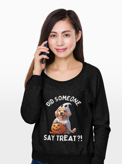 Woman wearing Printify black long sleeve Pet Lover Shirt with Halloween dog ghost and jack o lantern graphic