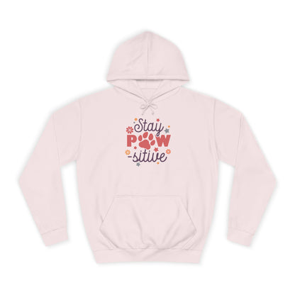 Printify light pink hoodie with Stay Pawsitive Unisex Hoodie paw print graphic and kangaroo pocket