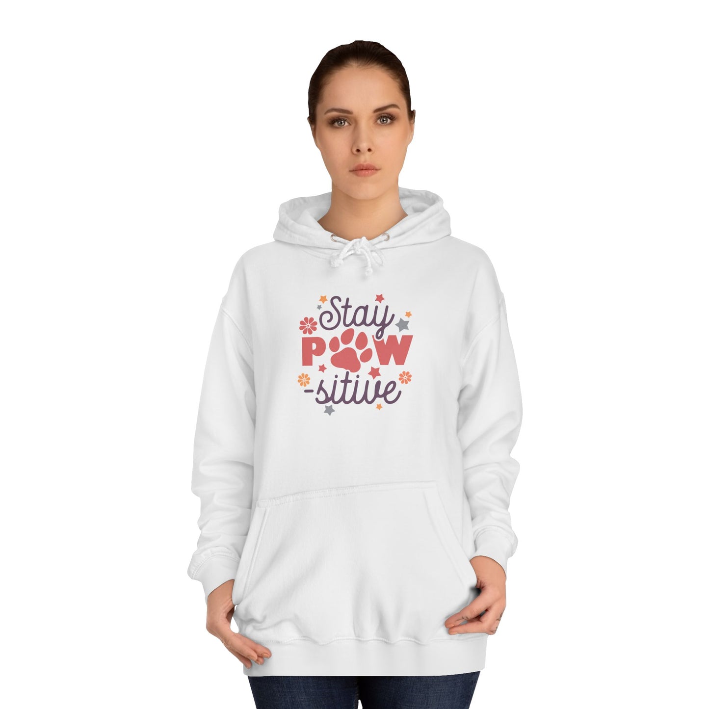 Woman wearing white Stay Pawsitive Unisex Hoodie with paw print and floral graphic front pocket hood casual pet lover gift
