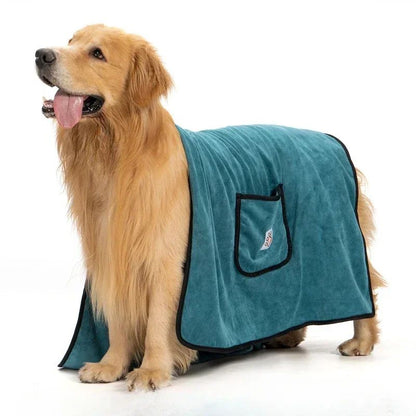 Golden Retriever wearing teal dog bathrobe towel quick dry with pocket and black trim for post bath drying