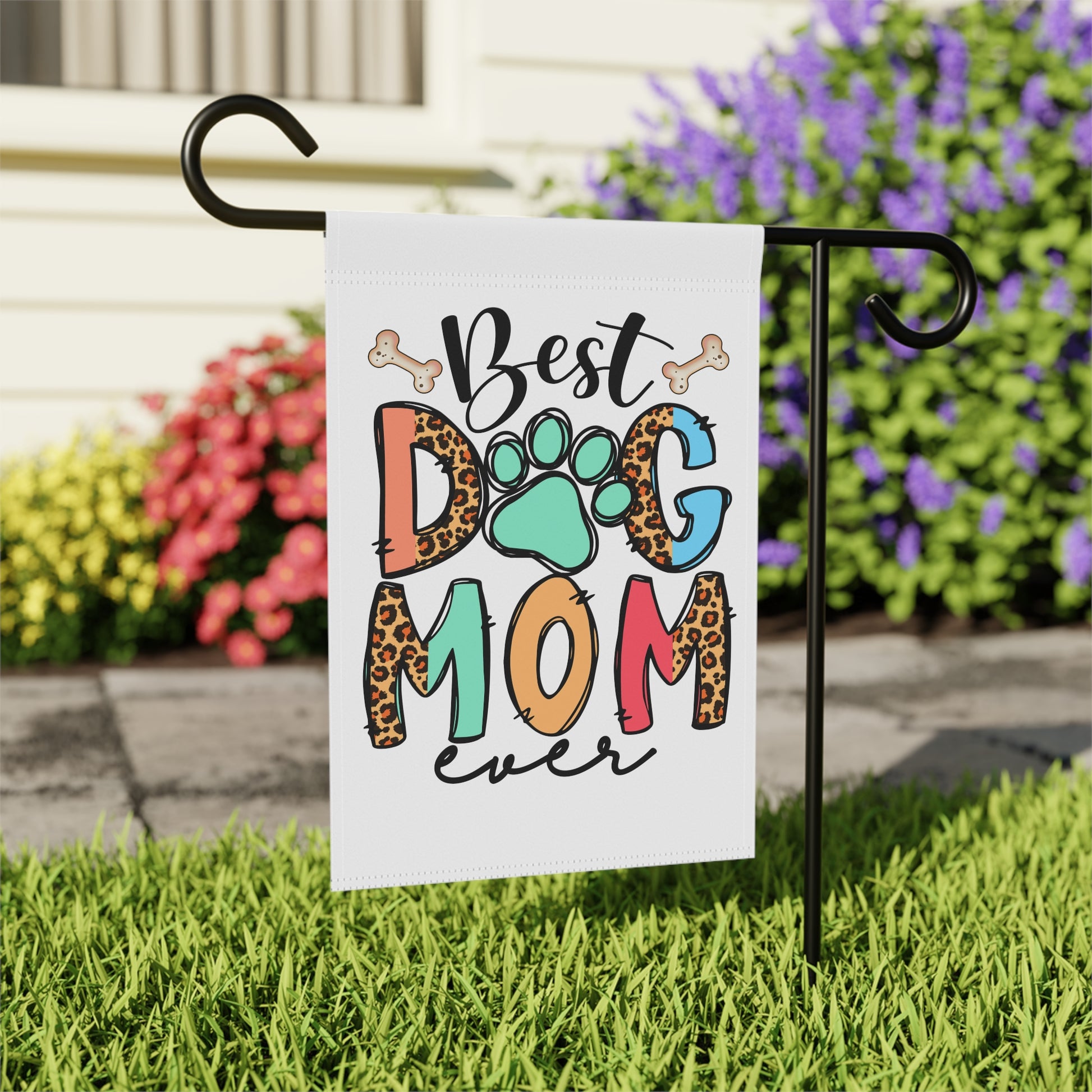 Dog Mom Garden Flag with colorful Best Dog Mom ever design paw print and leopard print letters on lawn